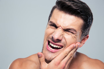 Young man with a toothache