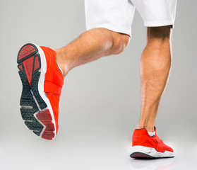 Closeup portrait of a sports male legs