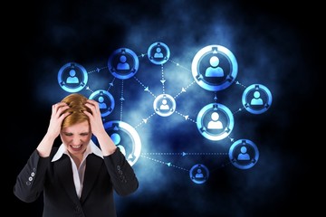 Composite image of stressed businesswoman with hands on her head