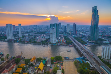 Landscape of river in Bangkok cityscape with sunset