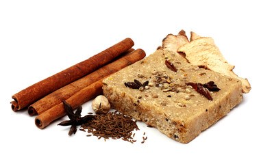 handmade soap with cinnamon and anise star on white background