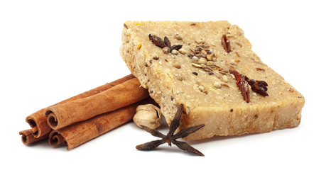 handmade soap with cinnamon and anise star on white background