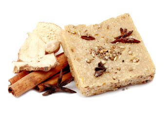 handmade soap with cinnamon and anise star on white background