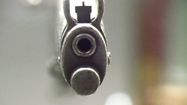 Closer look of the front of a shot gun and the hole infront where the bullets gets out