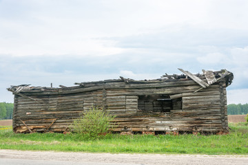 Destroyed log house.