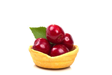 juicy ripe red cherries in tartlet