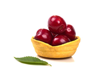 tartlet filled with ripe red juicy cherries