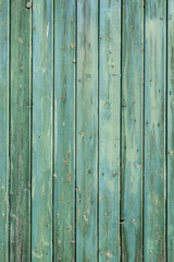 Naklejka premium wooden wall of shed consisiting of blue green planks