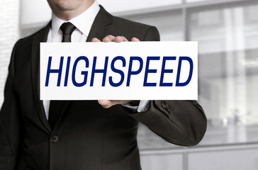 Obraz premium Highspeed; sign is held by businessman