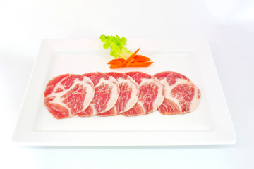 freshness slided pork on white dish for grill