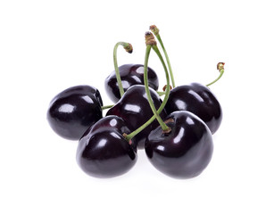   ripe black cherries  Isolated on a white background