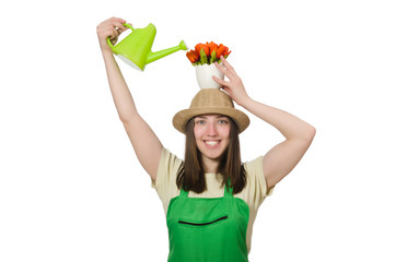 Girl watering plants on white