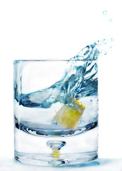 glass of water and a slice of lemon, spray