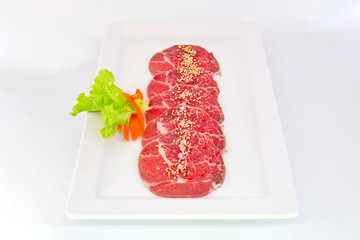 High grade sliced Hida wagyu beef isolated on white background