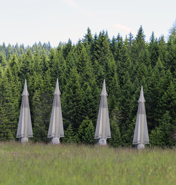 four military missiles hidden in forests ready to be launched