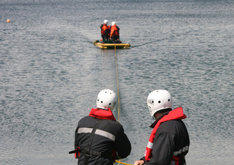 fire fighters at water rescue incident