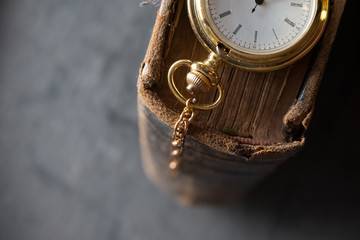 Vintage pocket watch old book