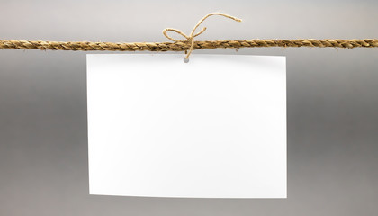 White paper on a gray background