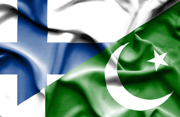 Waving flag of Pakistan and Finland