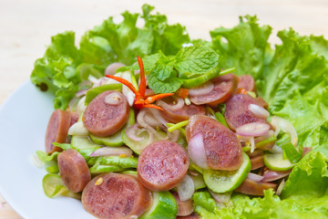 Chinese Sausage Salad on wood background