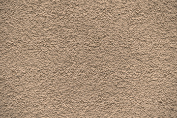 Yellow revetment wall putty macro texture background
