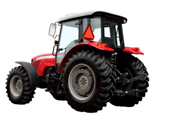 The modern red tractor is isolated on a white background