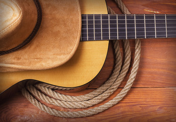  Country music picture with guitar and cowboy hat and rope