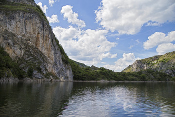 Beautiful natural lake. Sky and clouds reflection on lake