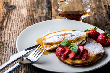 filled with homemade pancakes with strawberries