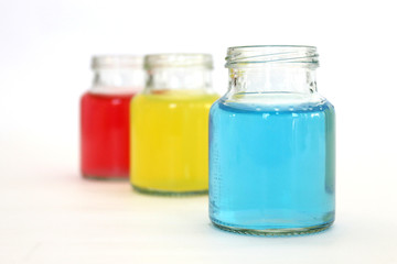 Fototapeta na wymiar colors water in bottles