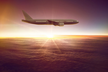Flying Airplane in front of a sunset
