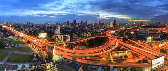 Bangkok city at twilight and main traffic high way, panorama