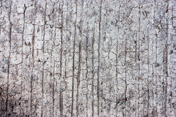 Textured walls with dirt.