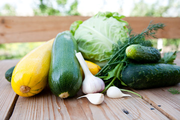 Fresh vegetables on wooden background