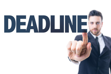 Business man pointing the text: Deadline