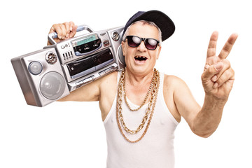Toothless senior rapper holding a boombox