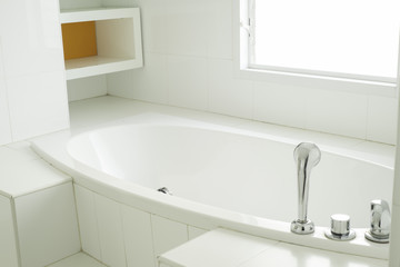 Bathtub in modern bathroom.
