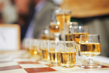 Chess set/Chess table with glass of drink
