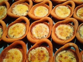 Spinach with cheese in clay pots