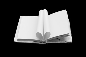 Heart Shaped Book isolated on black background.