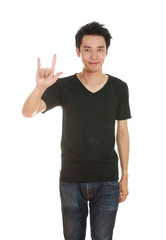Naklejka premium man in t-shirt with hand sign I love you