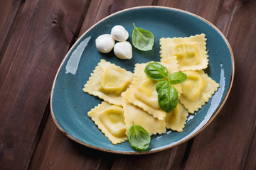 Italian ravioli stuffed with mozzarella cheese, above view