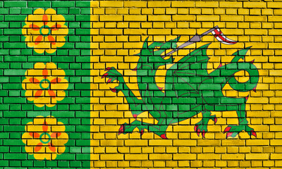 flag of Evenley painted on brick wall