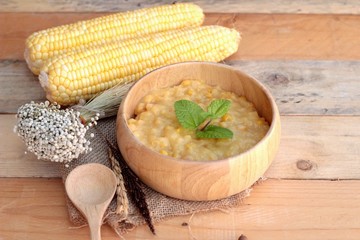 Corn soup of condensed in a wooden bowl