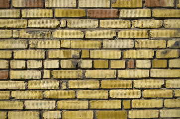 wall of yellow brick
