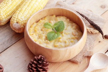 Corn soup of condensed in a wooden bowl