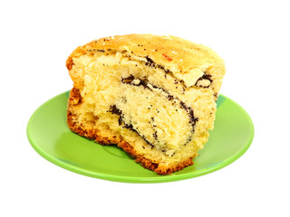 Piece of poppy cake isolated on white background.