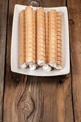 Sweet tube with whipped cream.