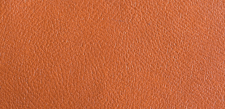 Brown leather texture closeup background