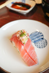 Authentic and traditional Japanese sushi with various kinds of f